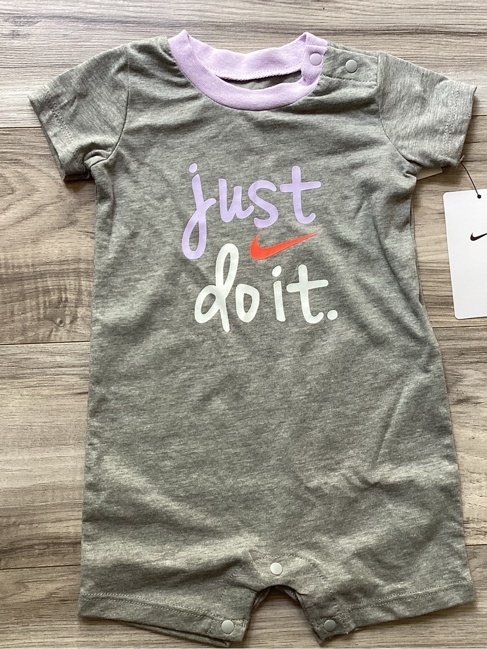 Baby girls Nike romper size 0-6 months(NWT) ~PRICE FIRM, NO OFFERS~
